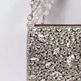 Grace Mini Bag with embroidered handle from The Tan Clan, stylish compact bag featuring detailed embroidery and a chic design.