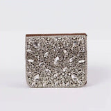 Grace mini bag by The Tan Clan featuring an embroidered handle and sleek design, perfect for stylish everyday use.