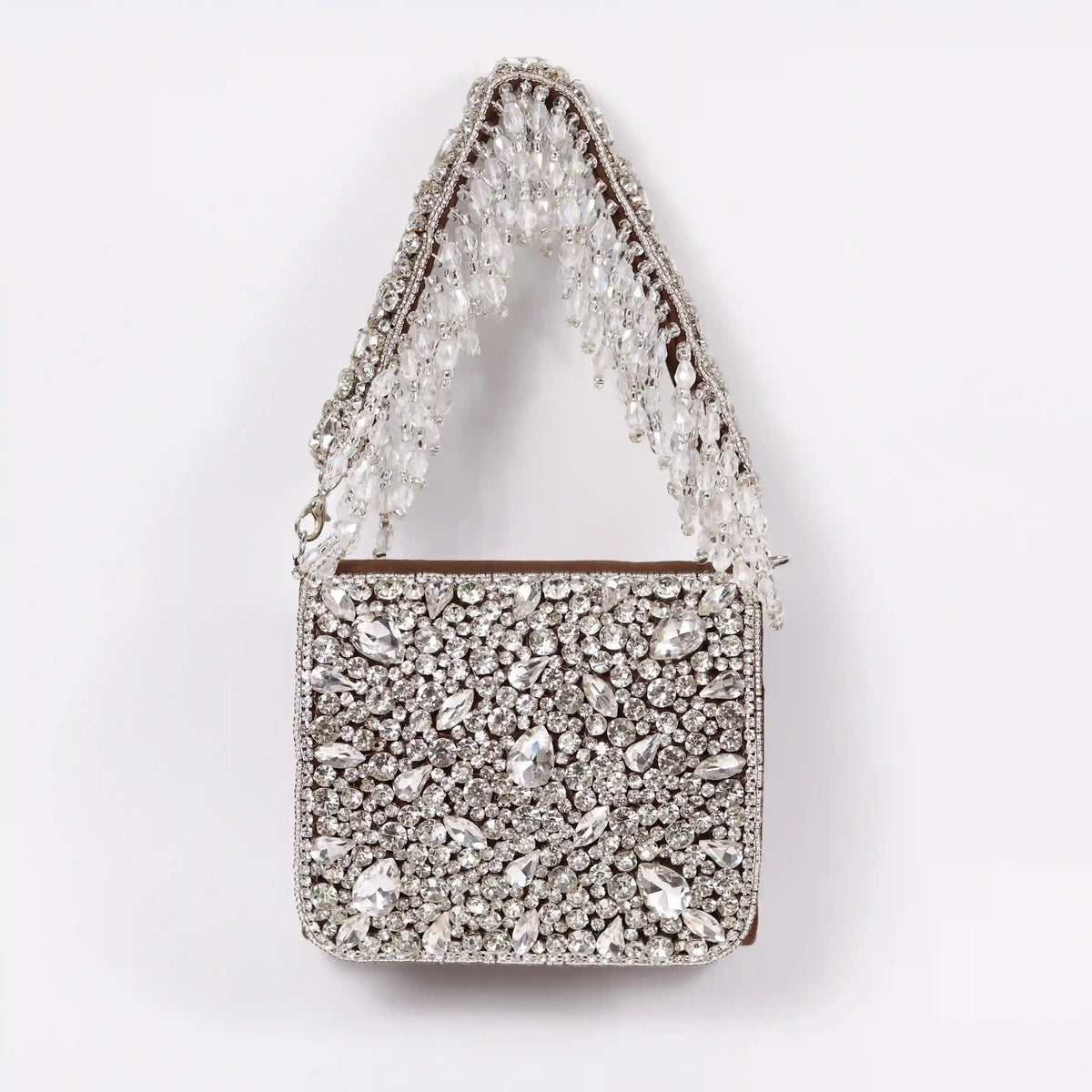 Grace Mini Bag by The Tan Clan featuring an embroidered handle and compact design, perfect for stylish everyday use.