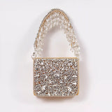Grace Mini Bag by The Tan Clan featuring an embroidered handle and compact design in soft, stylish leather.