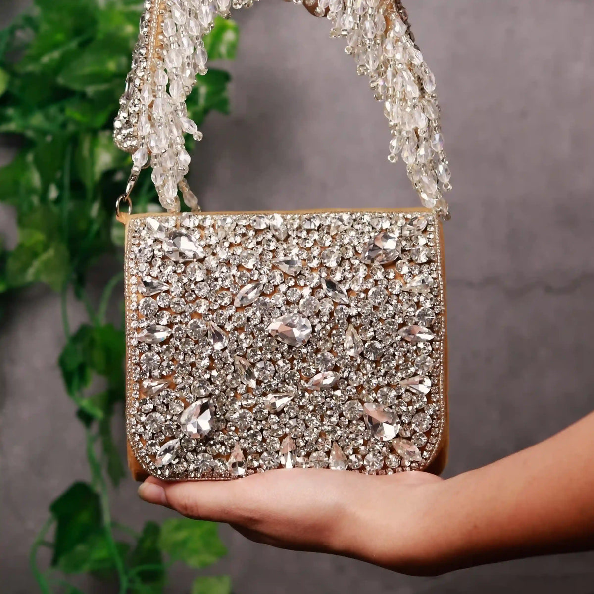 Grace Mini Bag by The Tan Clan featuring an embroidered handle and compact design, perfect for casual and elegant outings.