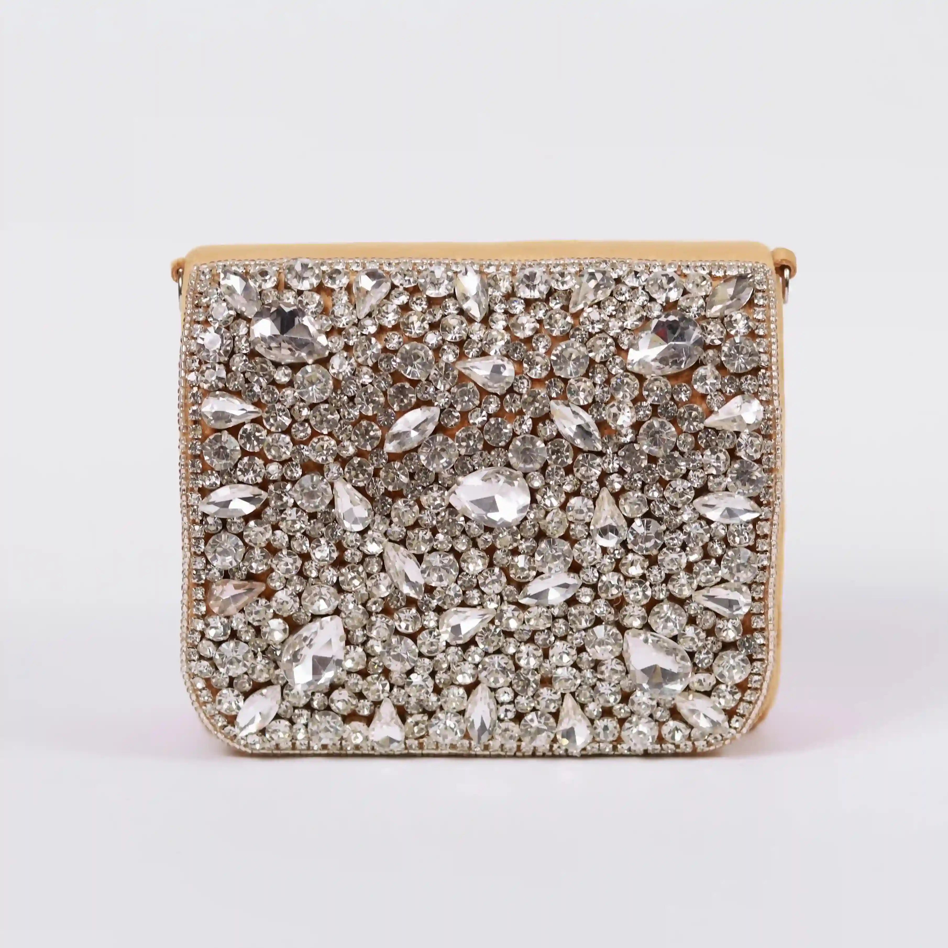 Golden Grace Mini Bag by The Tan Clan with embroidered handle, featuring a compact design and elegant detailing.