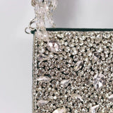 Grace Mini Bag by The Tan Clan featuring an embroidered handle and compact design, perfect for stylish everyday use.