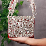 Grace Mini Bag by The Tan Clan featuring an embroidered handle and compact design, perfect for stylish everyday use.