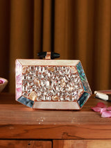 Hannah embellished mother of pearl clutch by The Tan Clan featuring intricate beadwork and a sleek, elegant design.