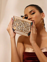 Hannah embellished mother of pearl clutch by The Tan Clan featuring intricate beadwork and a sleek design for elegant occasions.