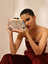 Hannah embellished mother of pearl clutch by The Tan Clan featuring intricate beadwork and a compact, elegant design.