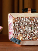 Hannah embellished mother of pearl clutch bag by The Tan Clan with intricate detailing and elegant design.