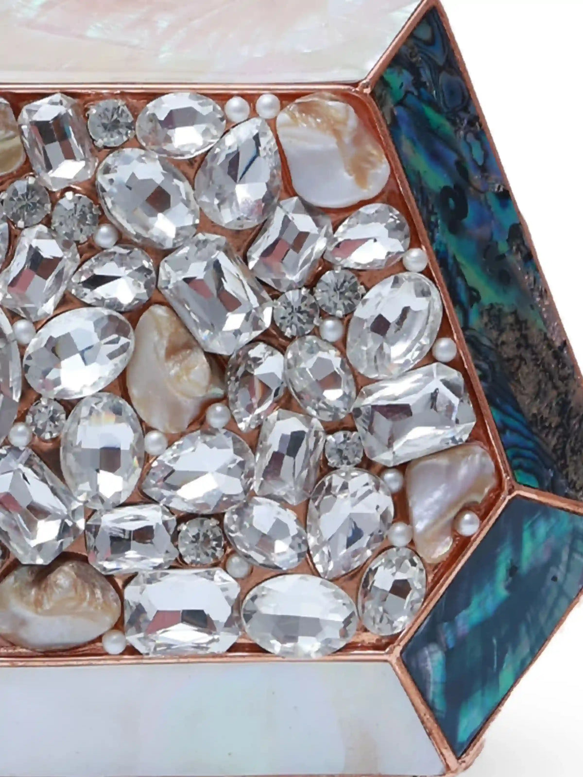 Hannah Embellished Mother of Pearl Clutch by The Tan Clan showing intricate pearl embellishments and sleek design.