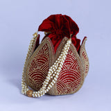 Hand-embroidered mini lotus potli bag by The Tan Clan with intricate design and traditional embroidery for elegant style.