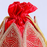 Hand-embroidered mini lotus potli bag by The Tan Clan with intricate embroidery and traditional style.