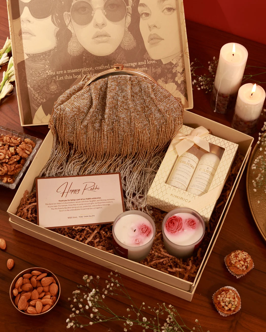 Beauty and skincare products in a gift hamper labeled Her Pamper Hamper - Amour from The Tan Clan, displayed in a gift box.