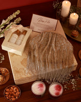 Her Pamper Hamper by The Tan Clan featuring skincare products, plush towels, and accessories in a luxurious gift set.