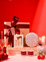 Her Pamper Hamper by THE TAN CLAN including an Ariba clutch, candle, and Kimirica set of 3, displayed with all items arranged together.
