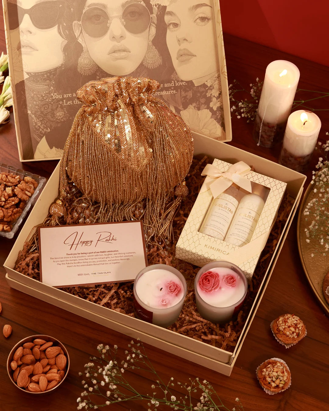 The Tan Clan Her Pamper Hamper Twinkle includes skincare products and spa essentials arranged in a luxurious gift basket.