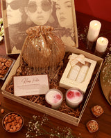 The Tan Clan Her Pamper Hamper Twinkle includes skincare products and spa essentials arranged in a luxurious gift basket.