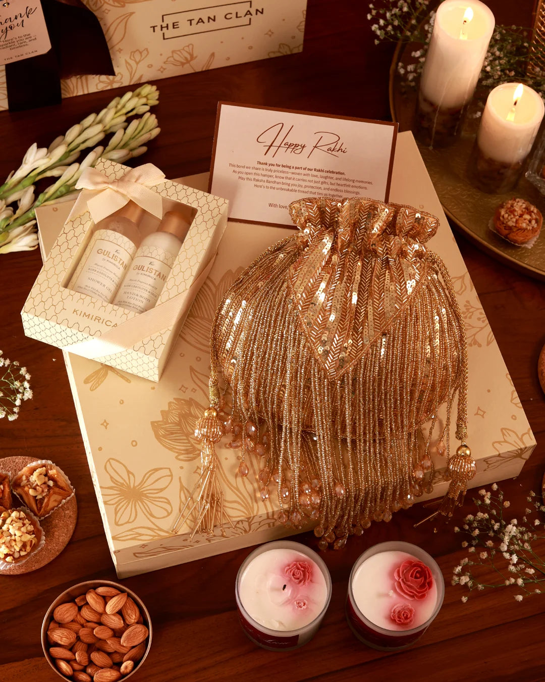 Her Pamper Hamper Twinkle by The Tan Clan, featuring skincare and relaxation products in a luxurious gift box.