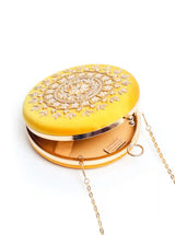 Yellow round embroidered clutch bag by The Tan Clan featuring intricate hand embroidery and a stylish design.