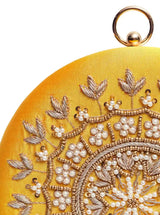Yellow round embroidered clutch bag with intricate hand embroidery, featuring a stylish design from The Tan Clan.