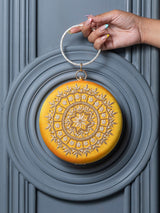 Yellow round embroidered clutch bag with intricate hand embroidery, crafted by The Tan Clan.