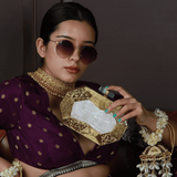 Inaayat brass clutch with mother-of-pearl inlay by The Tan Clan, featuring intricate design and elegant craftsmanship.