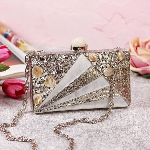 Iqra embellished mother of pearl clutch by The Tan Clan, featuring intricate design and elegant craftsmanship.