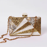 Embellished mother of pearl clutch by The Tan Clan with intricate detailing and elegant design for special occasions.