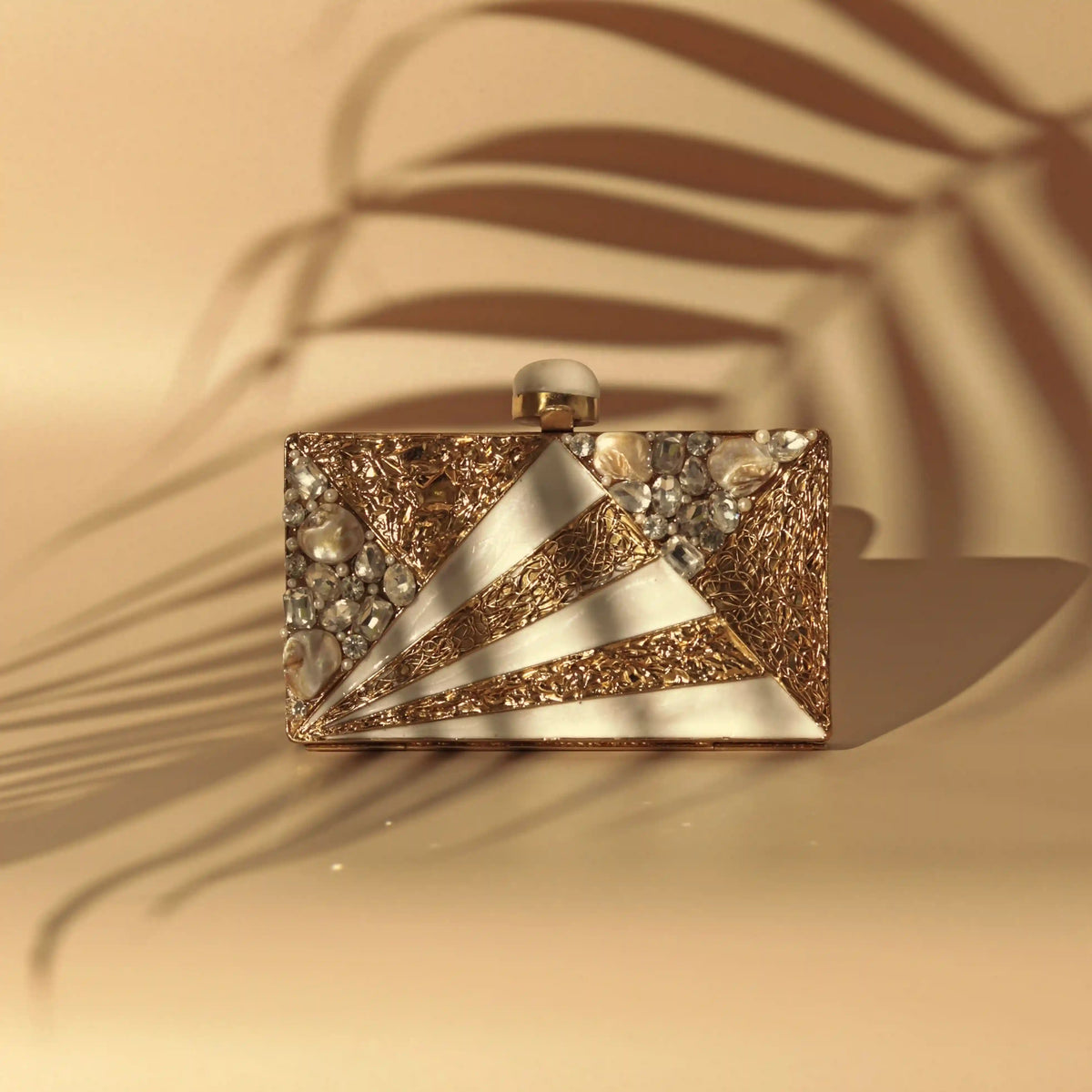 Iqra embellished mother of pearl clutch bag by The Tan Clan, featuring intricate design and elegant craftsmanship.