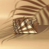 Iqra embellished mother of pearl clutch bag by The Tan Clan, featuring intricate design and elegant craftsmanship.