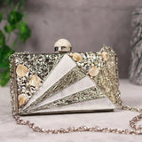 Elegant Iqra embellished mother of pearl clutch by The Tan Clan, featuring intricate detailing and a luxurious design.