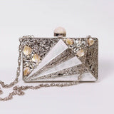 Elegant Iqra embellished mother of pearl clutch by The Tan Clan with intricate detailing and a sleek, compact design.