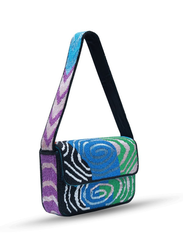 Tan Iris Baguette Bag with Handle from The Tan Clan, featuring a sleek, compact design and stylish carry handle.