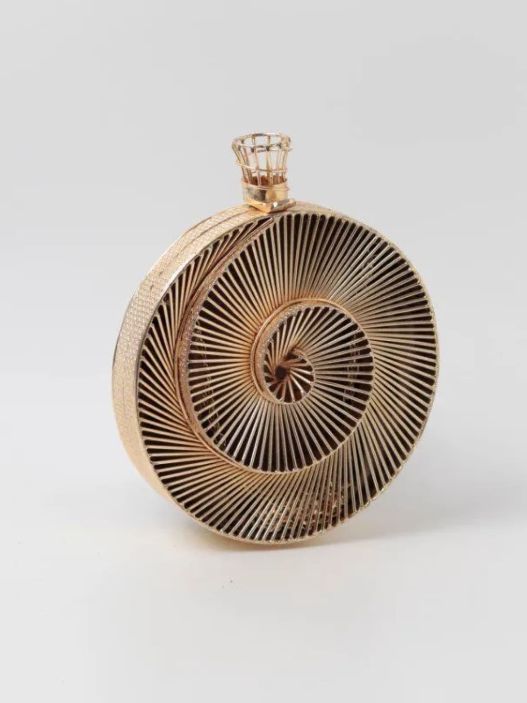 Isha Intricate Brass Wirework Clutch by The Tan Clan showing detailed brass wire design and elegant craftsmanship.