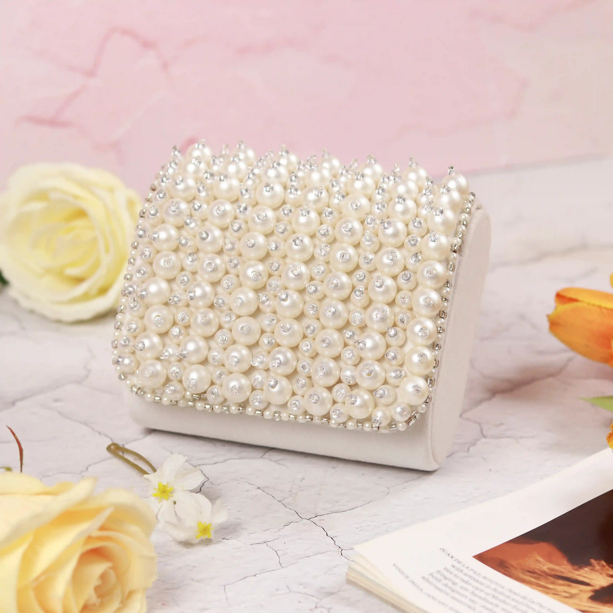 Jade mini bag from The Tan Clan with an embroidered handle, featuring a compact design and stylish detail.