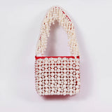 Jade Mini Bag by The Tan Clan featuring an embroidered handle and compact design for stylish everyday use.