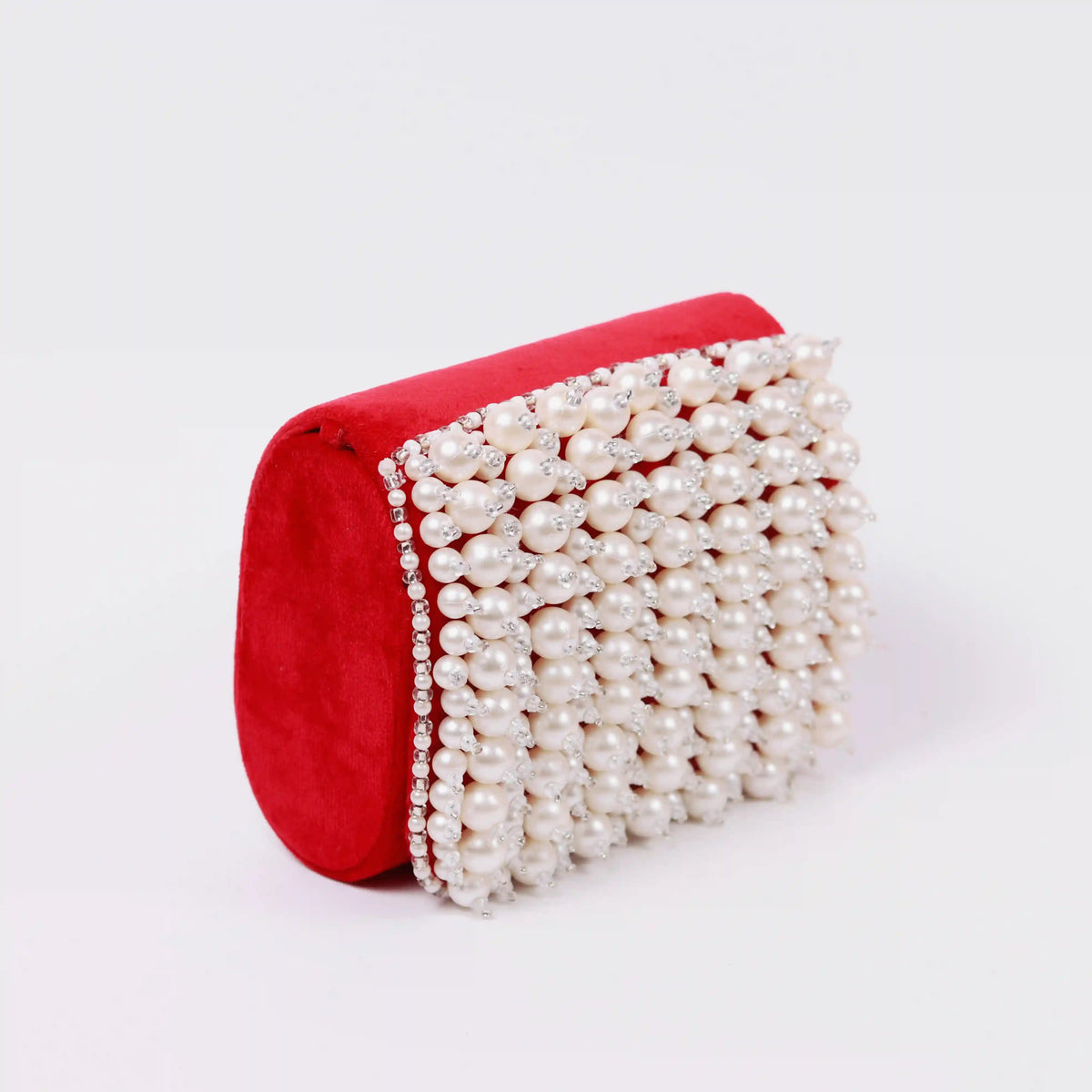 Jade mini bag by The Tan Clan with embroidered handle, featuring a compact design and stylish detailing.