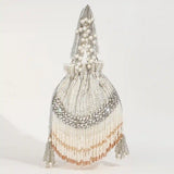 Jalsa Potli Bag with Handle by The Tan Clan, featuring traditional fabric and decorative tassels for elegant accessory use.