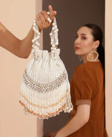 Jalsa Potli Bag with Handle by The Tan Clan, stylish fabric handbag featuring traditional design and drawstring closure.