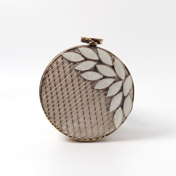 Jannat brass clutch with intricate brass and mother of pearl inlay, featuring detailed traditional craftsmanship and elegant design.