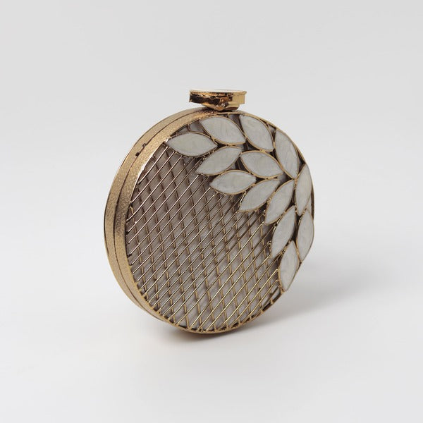Jannat brass clutch with intricate brass work and mother of pearl detailing, showcasing elegant craftsmanship and traditional design.