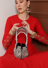 Jhalak Potli Bag with Handle by The Tan Clan, cream-colored with intricate embroidery and a stylish handle, for traditional occasions.