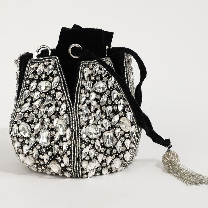 Jhalak Potli Bag with Handle by The Tan Clan, featuring intricate embroidery and a traditional design for festive occasions.