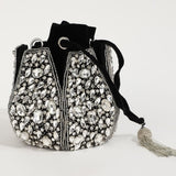 Jhalak Potli Bag with Handle by The Tan Clan, featuring intricate embroidery and a traditional design for festive occasions.