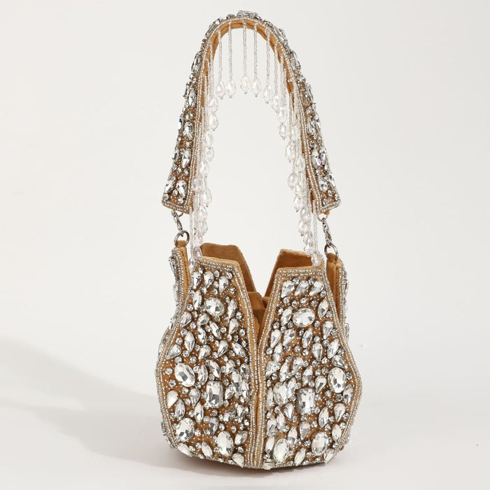 Jhalak Potli Bag with Handle by The Tan Clan, featuring traditional design and decorative elements, perfect for festive occasions.