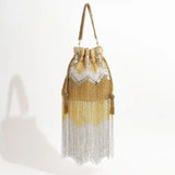 Elegant Jhoomar Potli Bag with Handle from The Tan Clan featuring intricate embroidery and traditional design.