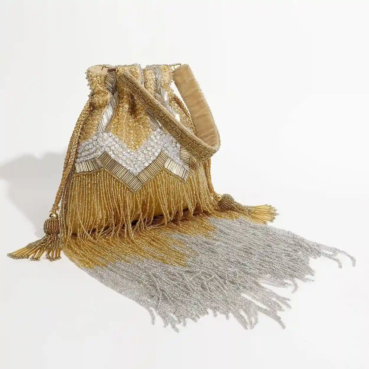 Jhoomar Potli bag with handle from The Tan Clan, featuring traditional embroidery and decorative tassels for ethnic occasions.