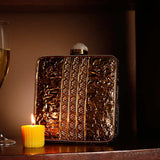 Liyana Mother of Pearl Clutch by The Tan Clan featuring iridescent pearl accents and a sleek rectangular design.