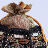 Hand embroidered Magha Half Lotus Potli bag by The Tan Clan with intricate embroidery and traditional design.