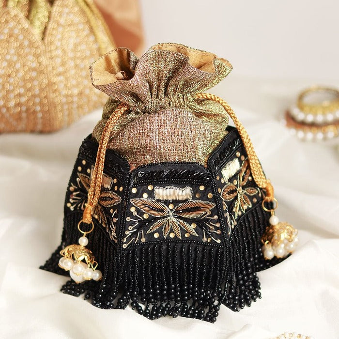 Hand embroidered Magha Half Lotus Potli bag by The Tan Clan with intricate embroidery and traditional design.