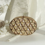 Maya 3D Mother of Pearl Clutch by The Tan Clan featuring iridescent pearl finish and sleek design for elegant occasions